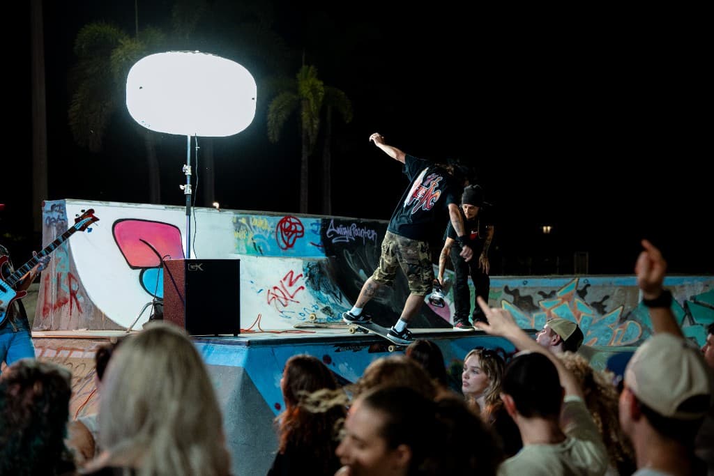 Skateboarder on the ramp with production lighting