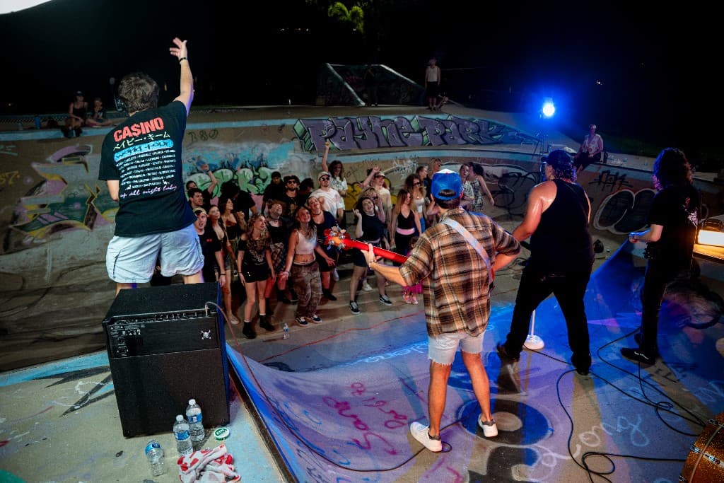 Crowd in the skate bowl watching the Crashing Down performance