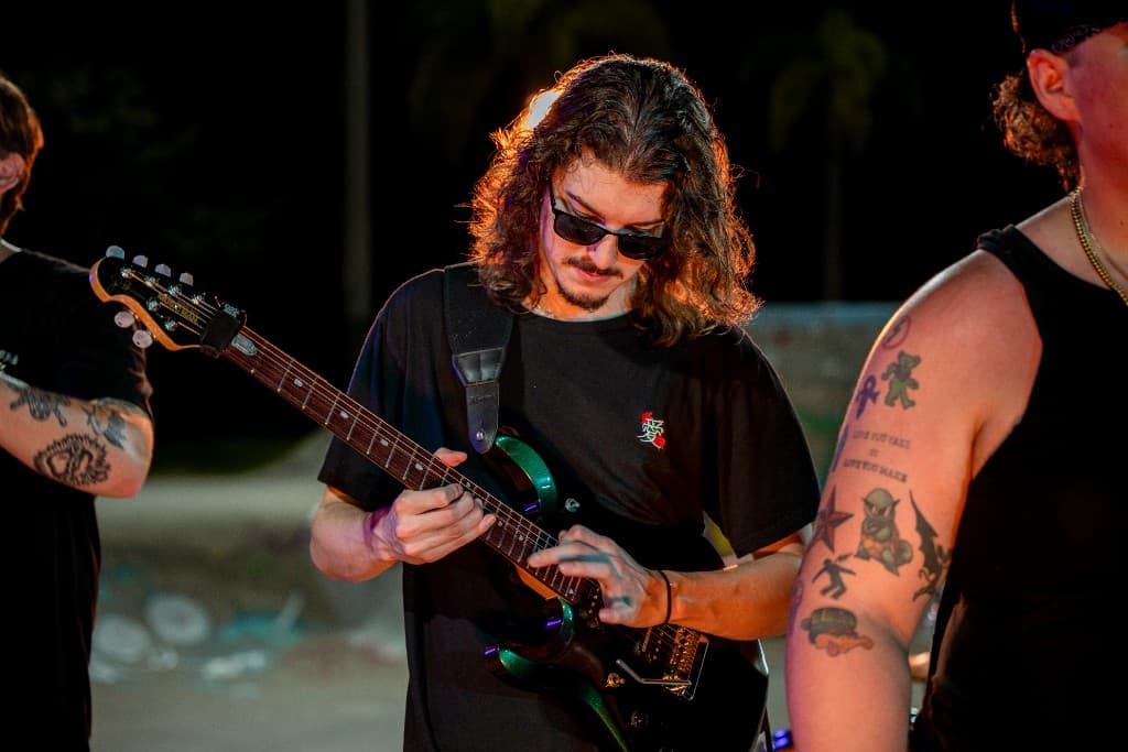 Guitarist performing during the Crashing Down shoot