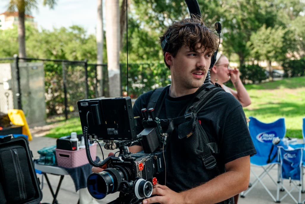Camera operator with a RED cinema camera on set
